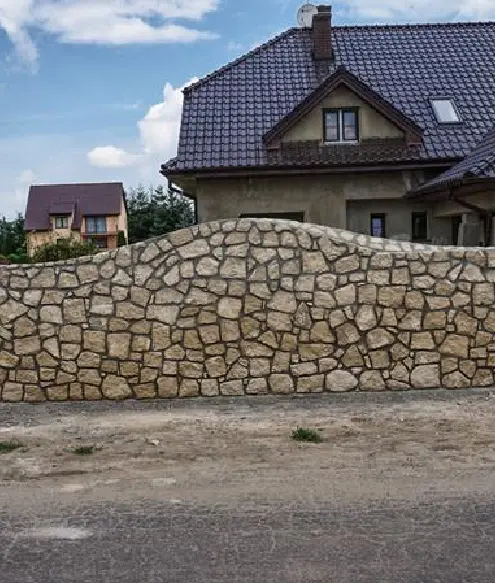 Natursteinzaun Alles aus Naturstein